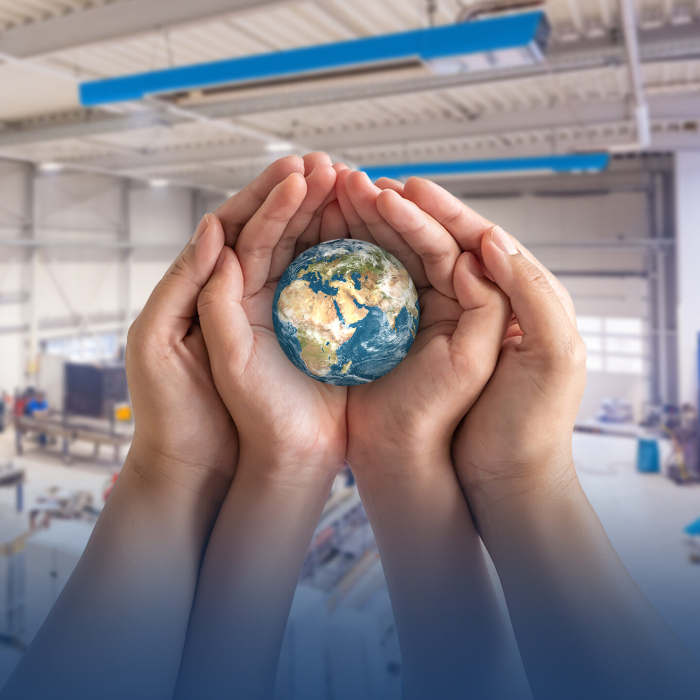 Decarbonization of industry - picture with hands in front of a hall heater in a hall enclosing a globe.