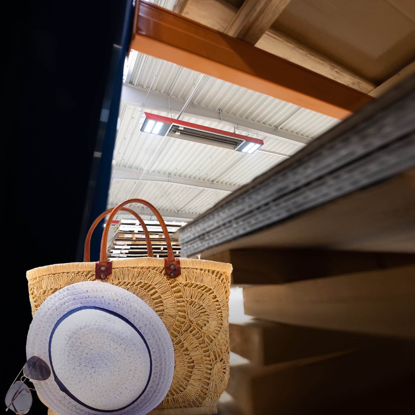 Straw hat on basket bag in warehouse