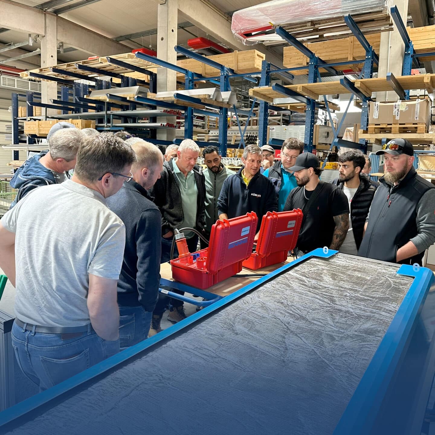 Employees inspect tools in the warehouse