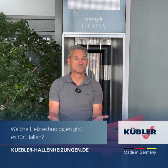 Man in front of Kübler heating technology information board