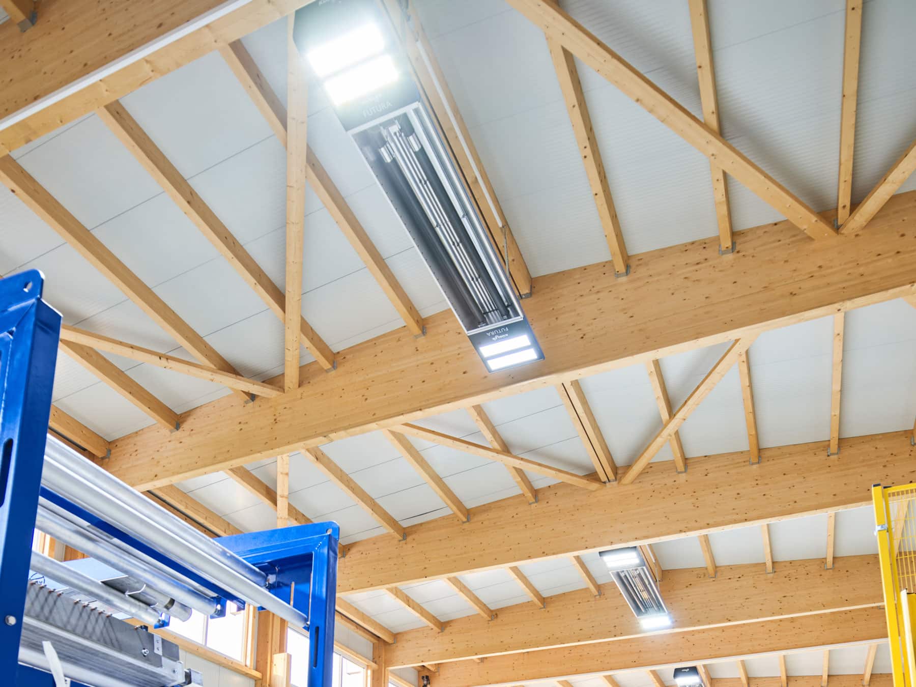 Wooden roof construction with integrated lighting