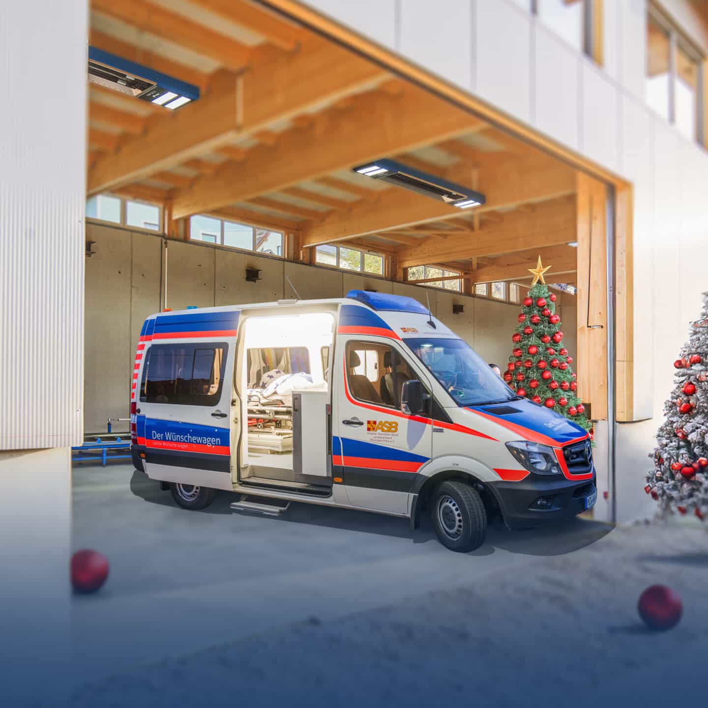 Ambulance in front of Christmas tree in garage