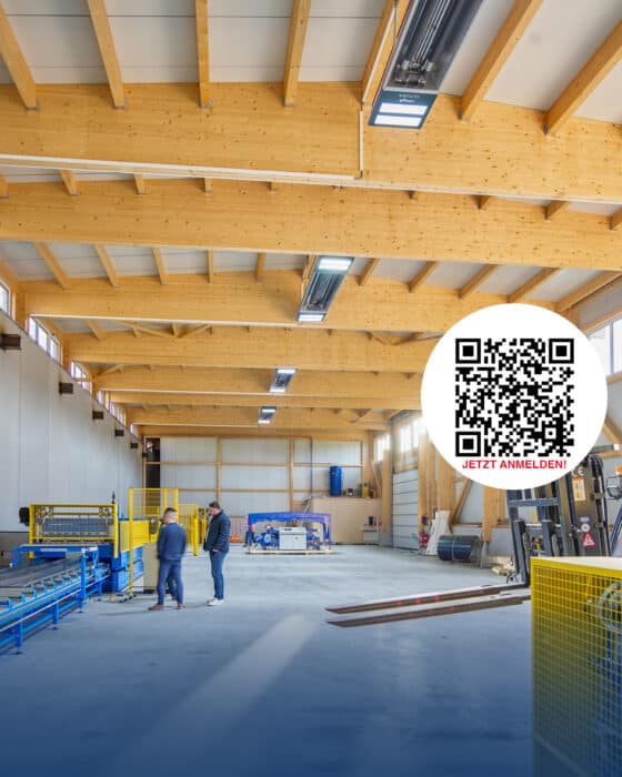 Men in a modern timber construction hall with machines